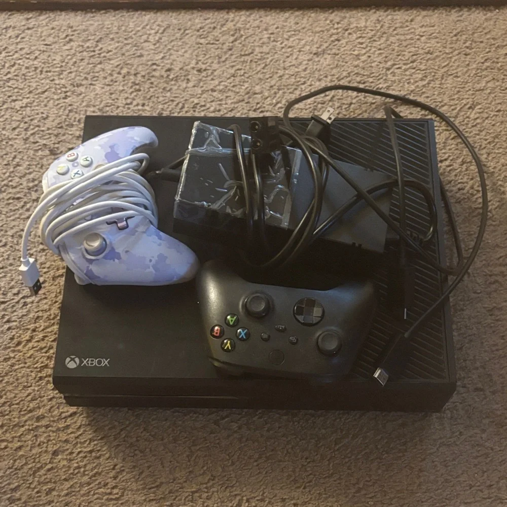 One Black Console Bundle with Black and White Controllers